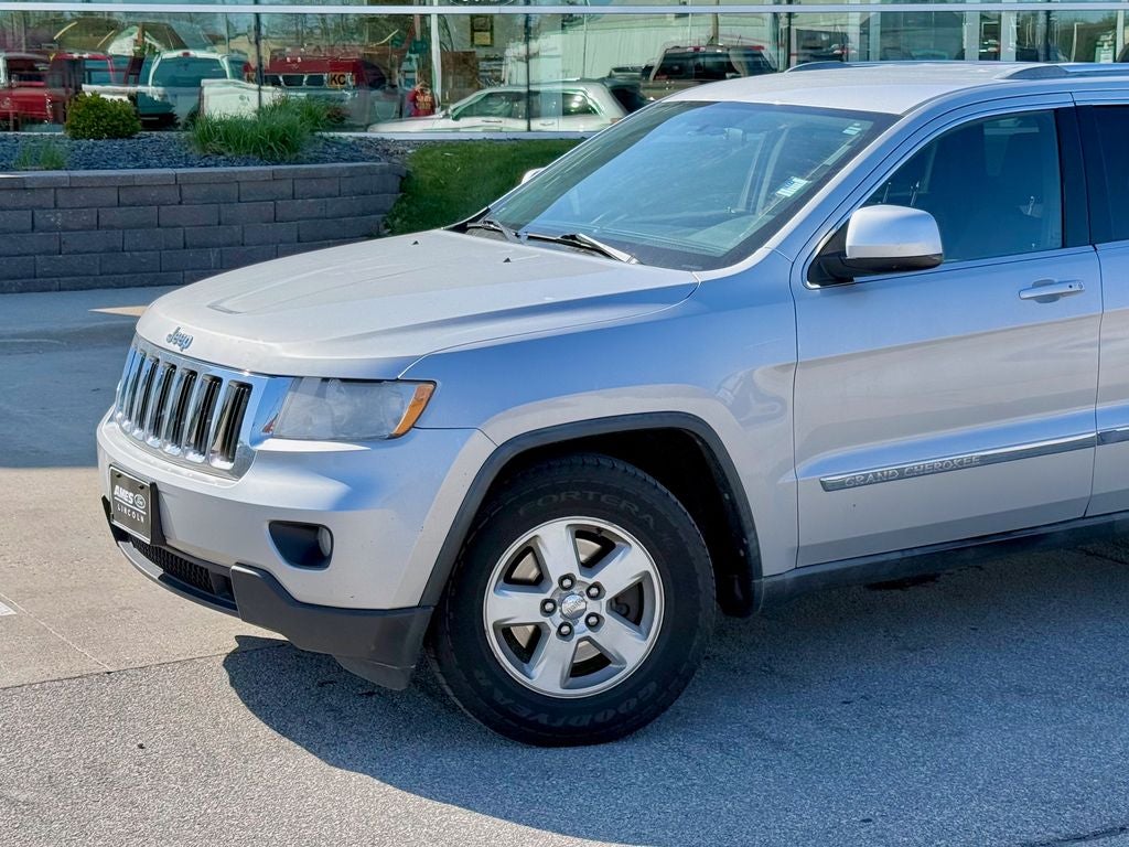 Used 2012 Jeep Grand Cherokee Laredo with VIN 1C4RJFAG8CC107996 for sale in Story City, IA