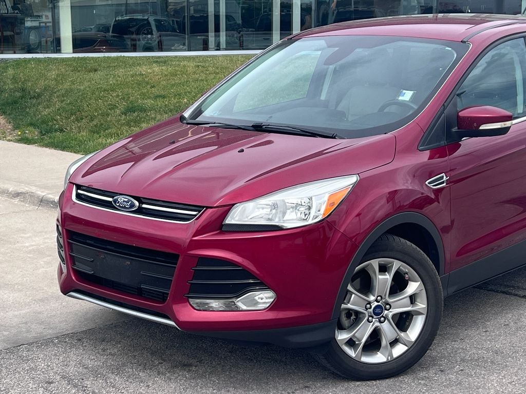 Used 2013 Ford Escape SEL with VIN 1FMCU9H91DUD80534 for sale in Story City, IA