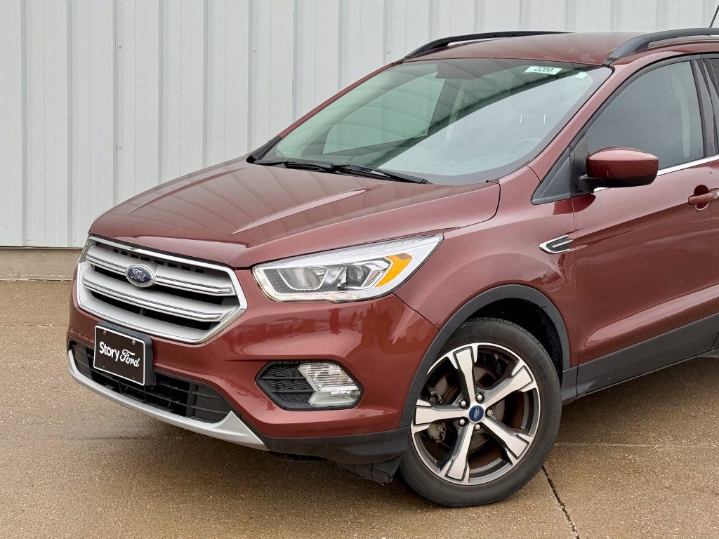 Used 2018 Ford Escape SEL with VIN 1FMCU0HD8JUA57092 for sale in Story City, IA