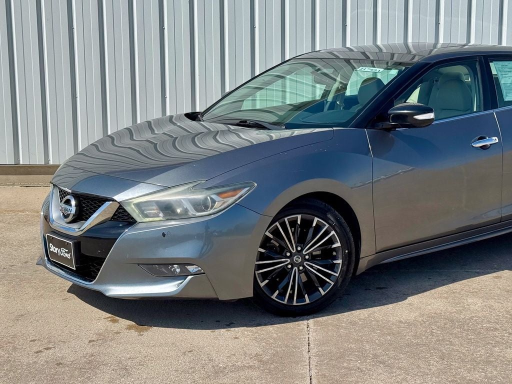 Used 2016 Nissan Maxima SL with VIN 1N4AA6AP3GC448358 for sale in Story City, IA